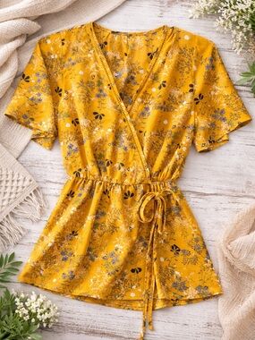 Sienna Sky Yellow Floral V neck blouse faux wrap with tie bow